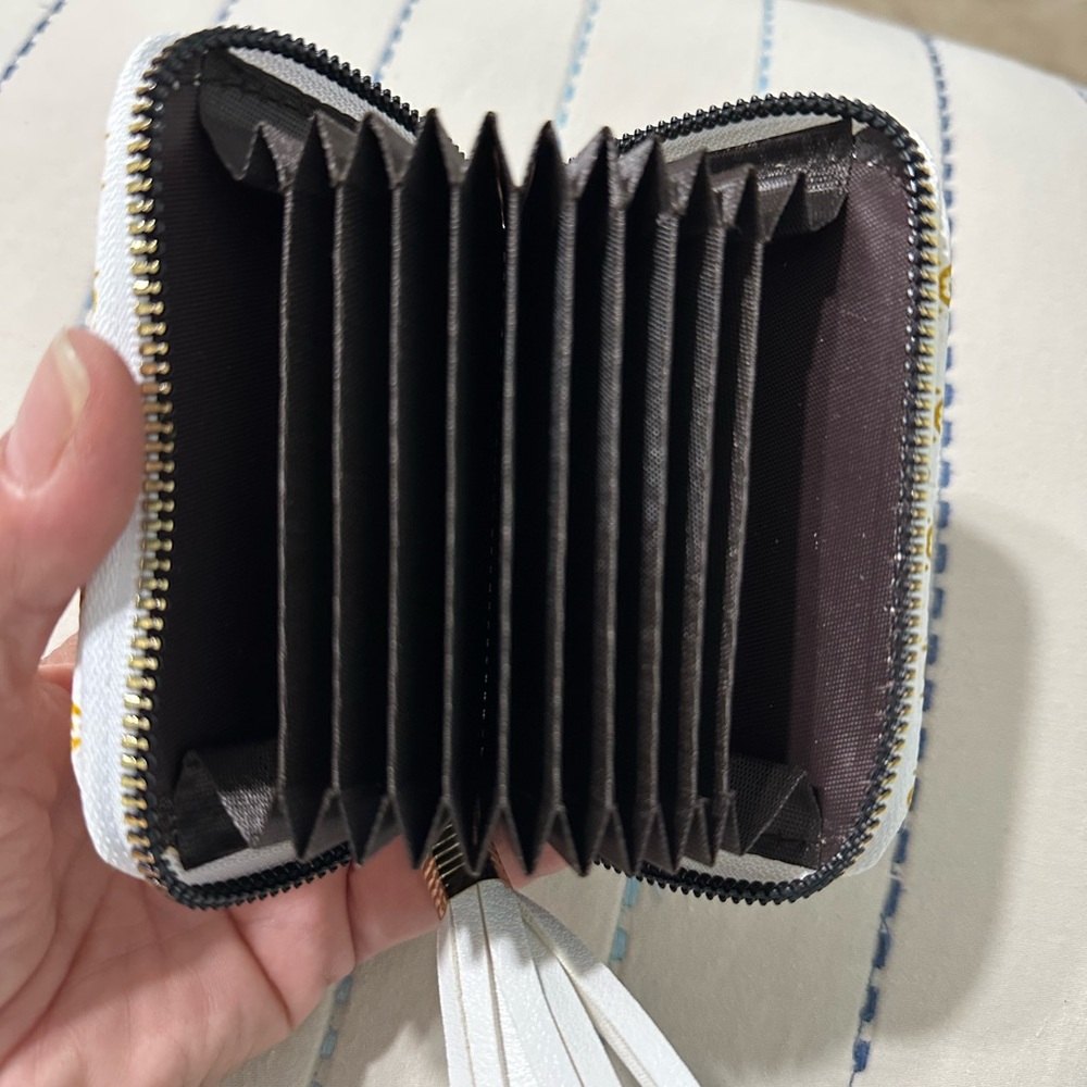 White Wallet with Gold Medallion Pattern